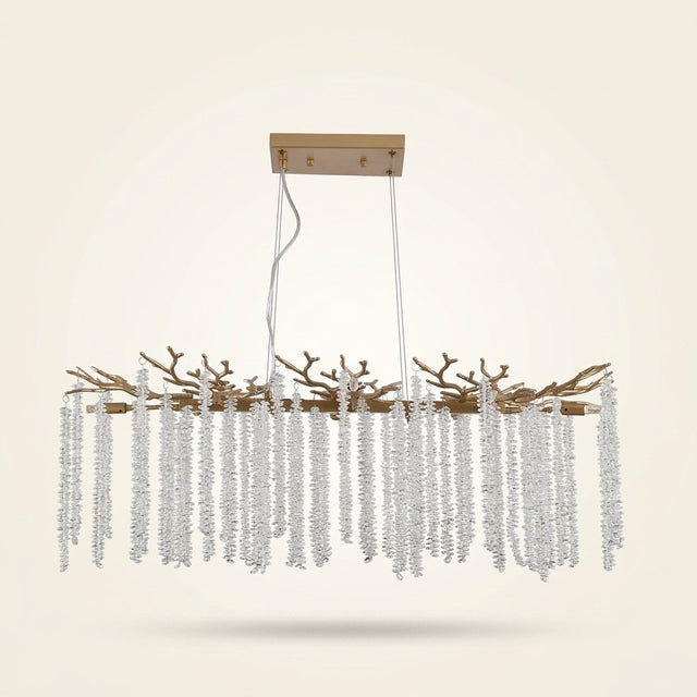 Cascading Crystal Pendant Light, 39 In. Gold Iron Frame on a warm cream background