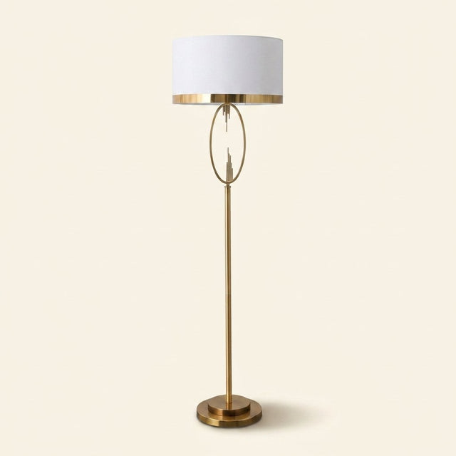 Brass Hoop Floor Lamp with White Drum Shade, 65 Inch on a warm cream background
