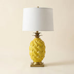 Ceramic Pineapple Table Lamp, Yellow with Brass-Tone Base on a warm cream background