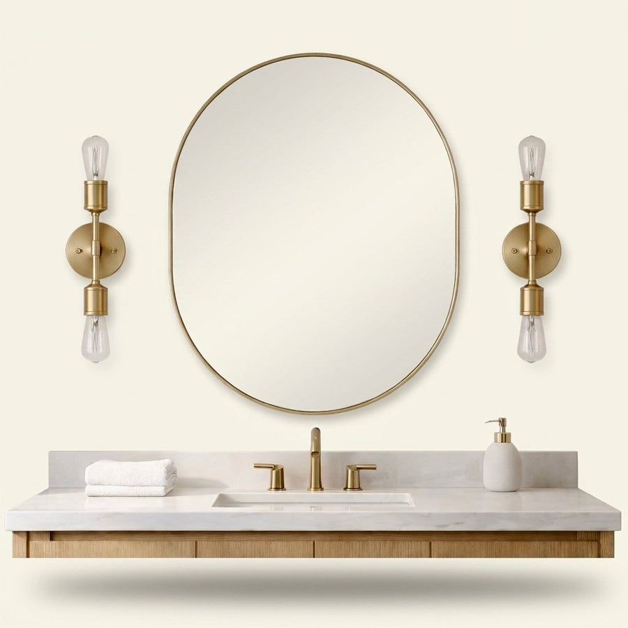 Modern 2-Light Wall Sconce, Gold Finish, for Bathroom Vanity Over Mirror on a warm cream background