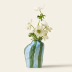 Striped Ceramic Flower Vase, Glossy Blue and Green, for Dining Table Centerpiece on a warm cream background