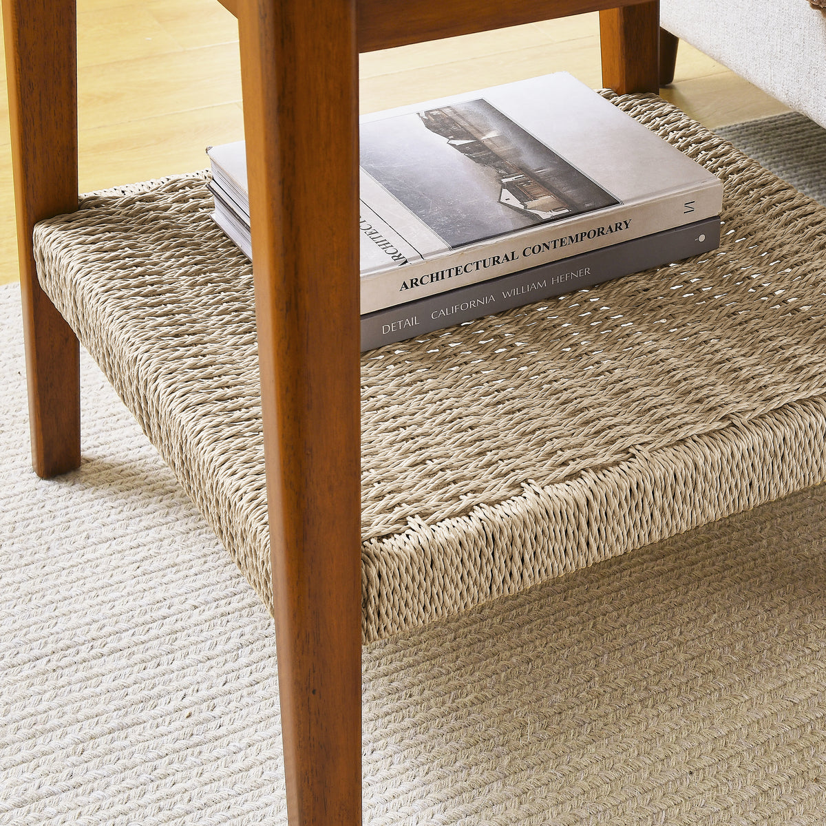 Mid-century side table — detail of the woven cord shelf and tapered wood leg