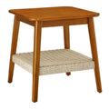 Mid-century side table with woven cord shelf and tapered legs on a plain white background