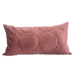 Long lumbar quilted velvet pillow cover in dusty rose on a plain white background