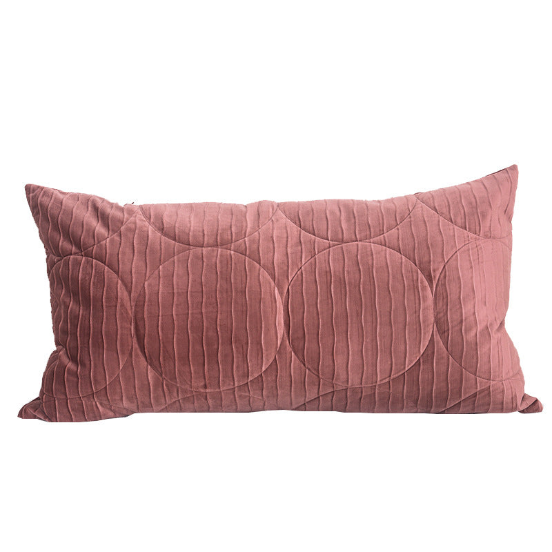 Long lumbar quilted velvet pillow cover in dusty rose on a plain white background