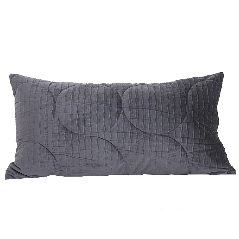 Long lumbar quilted velvet pillow cover in smoke grey on a plain white background
