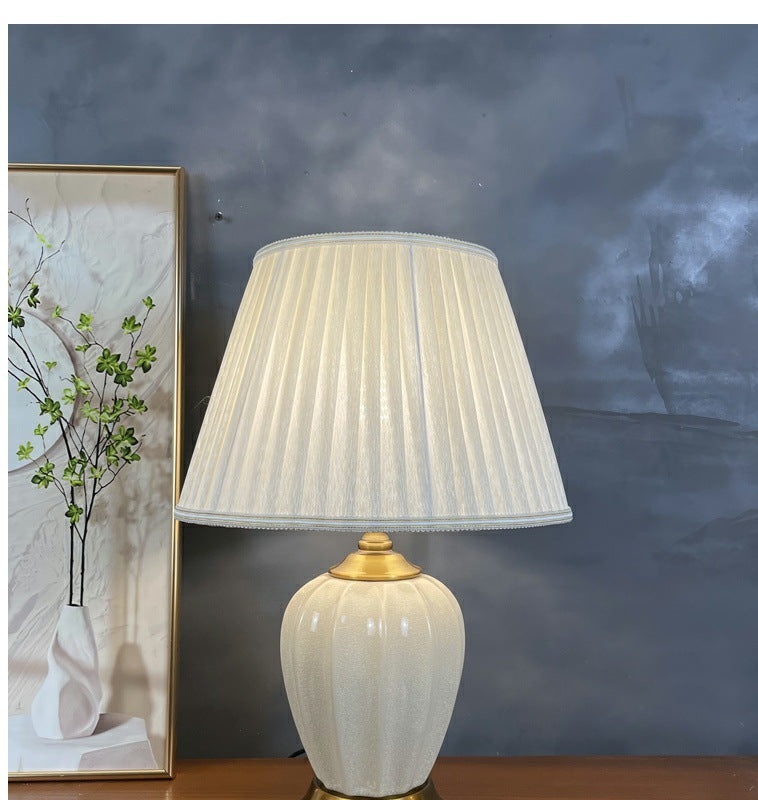 Ribbed cream ceramic table lamp — close view of the crackle glaze and pleated shade