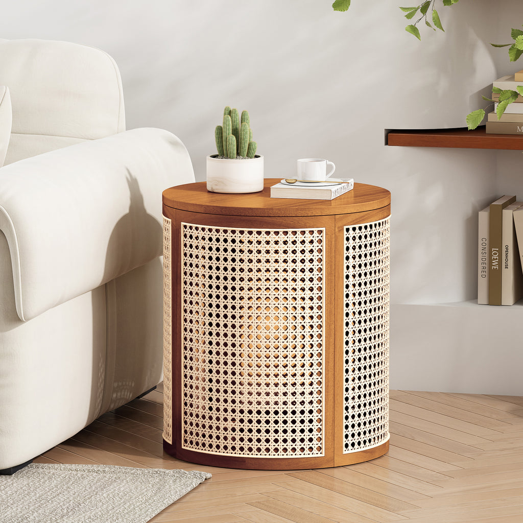 Round cane drum side table beside a cream sofa with a cactus, a book and a cup