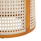 Cane drum side table — detail of the open cane weave and ochre wood post