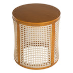 Round cane drum side table with an ochre wood top on a plain white background