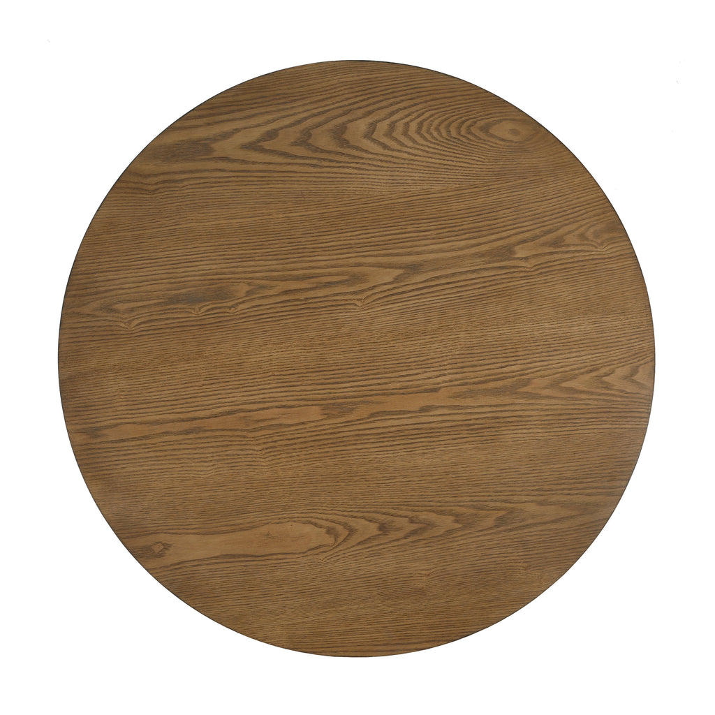 Round cane coffee table — top-down view of the open wood grain
