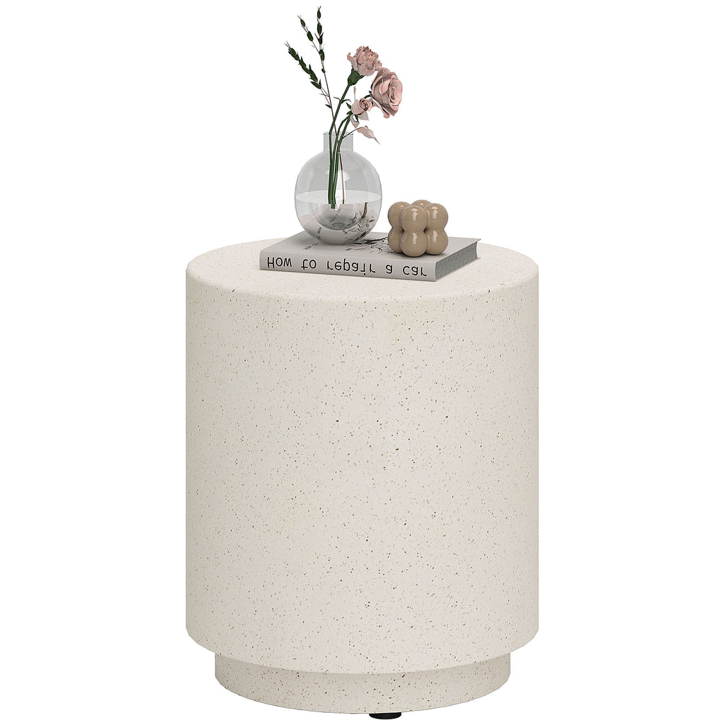 Speckled concrete-look drum side table on a plain white background, styled with a vase of roses and a book