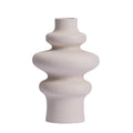 Stacked ring ceramic vase, three ring style, in speckled matte cream on a plain white background