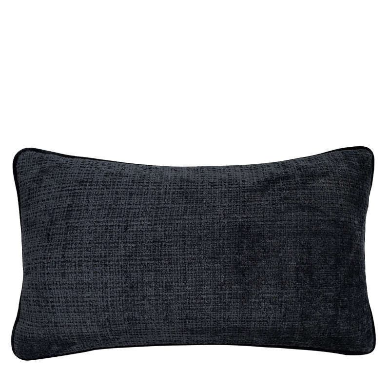 Textured chenille lumbar pillow cover in charcoal with piped edge on a plain white background