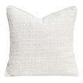 Textured chenille pillow cover in ivory, square, with piped edge on a plain white background