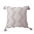Square cream tufted pillow cover, zigzag pattern, on a white background