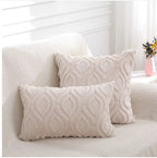 Tufted ogee plush pillow covers in beige, lumbar and square sizes, on a knit-draped sofa