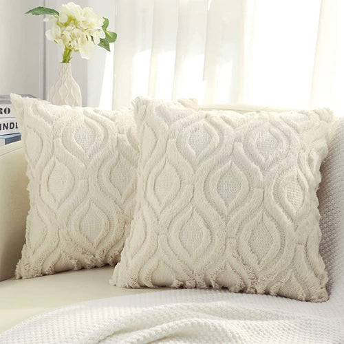Tufted ogee plush pillow cover in beige, two square pillows on a cream sofa by a sheer curtain