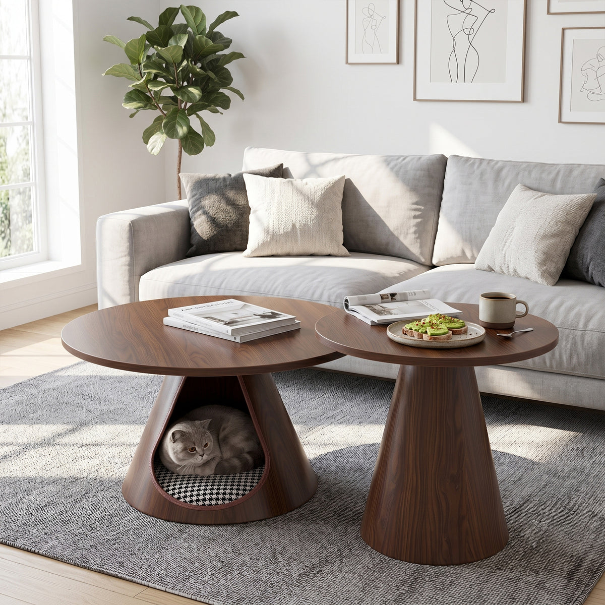 Two walnut-finish cone tables nested together before a grey sofa, a cat resting in the cave
