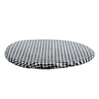 Black and white houndstooth cushion that lines the cat cave, on a plain white background