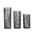 Black wavy iron rod pillar candle holders in small, medium and large on a plain white background