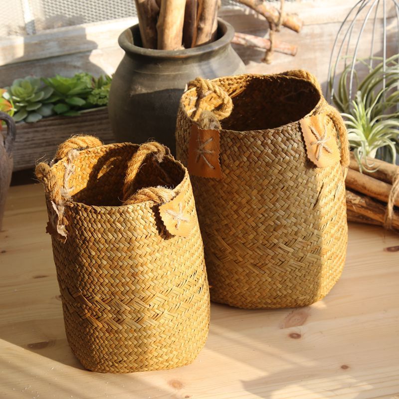 Caramel seagrass baskets in small and large sizes, sold together as a set of two